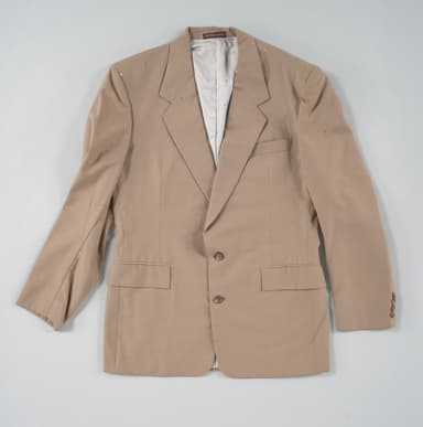Sand-colored linen blazer on a model
